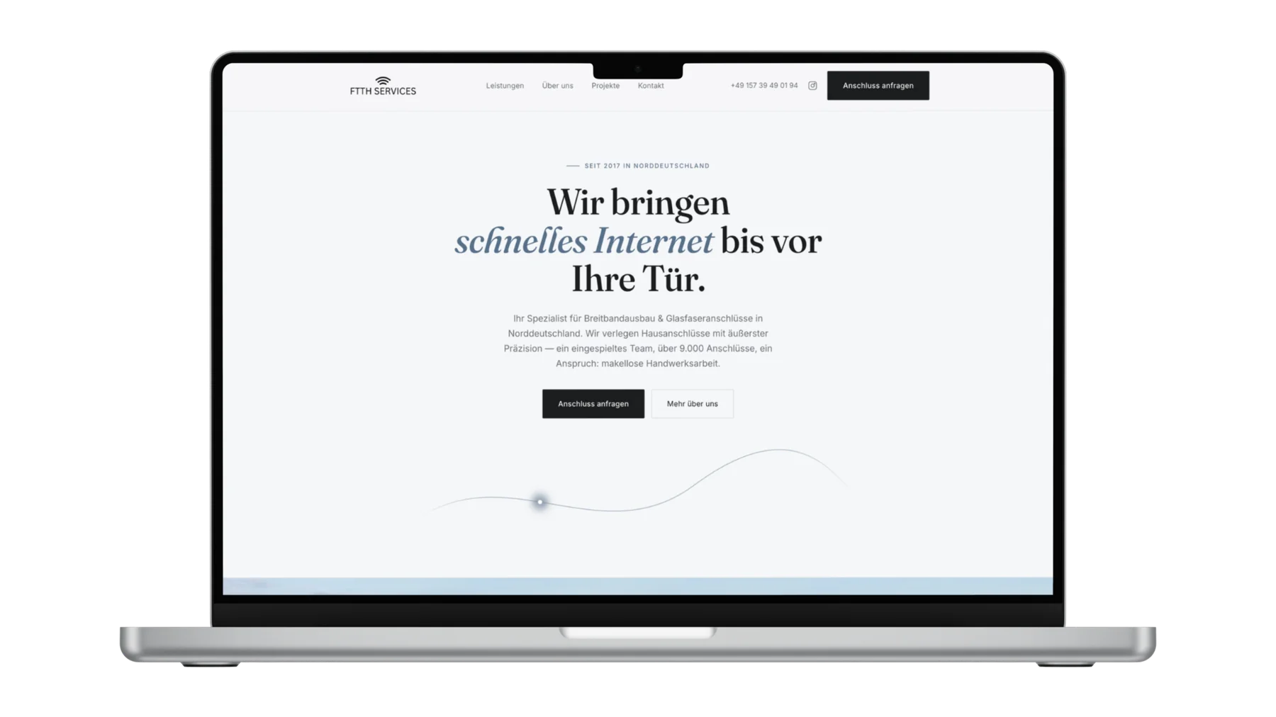 Weiteres Website-Beispiel, gezeigt auf einem MacBook